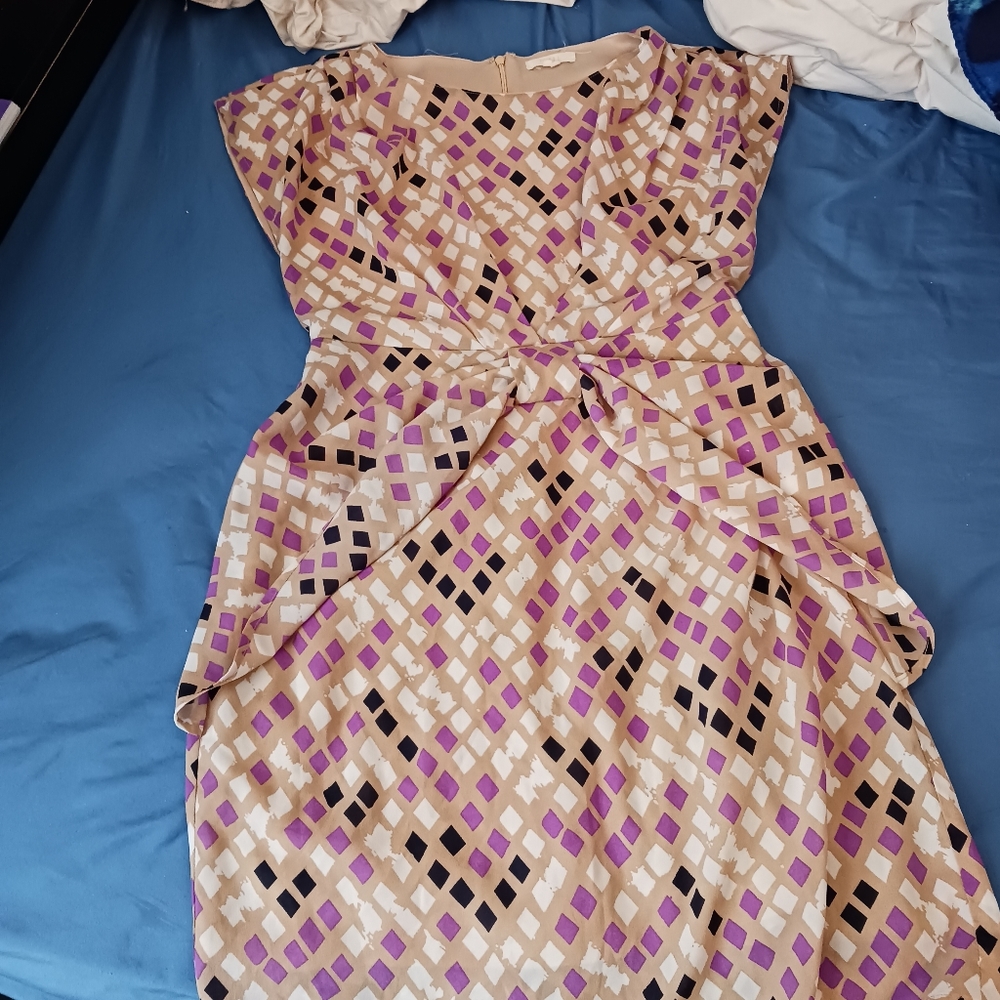 A multi colored dress from Tulle in a small.